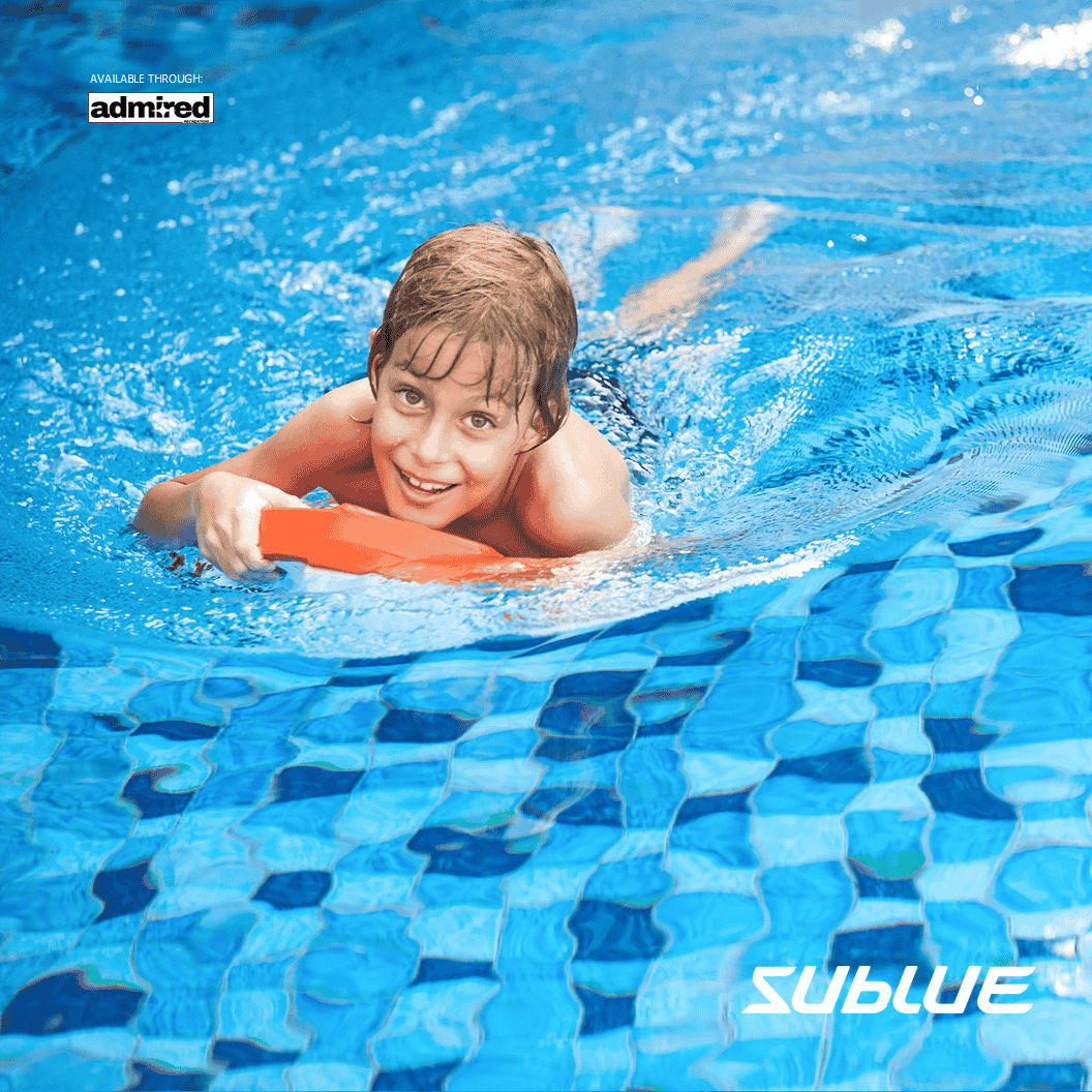 Child swimming with SUBLUE Swii Electronic Kickboard in a blue pool.