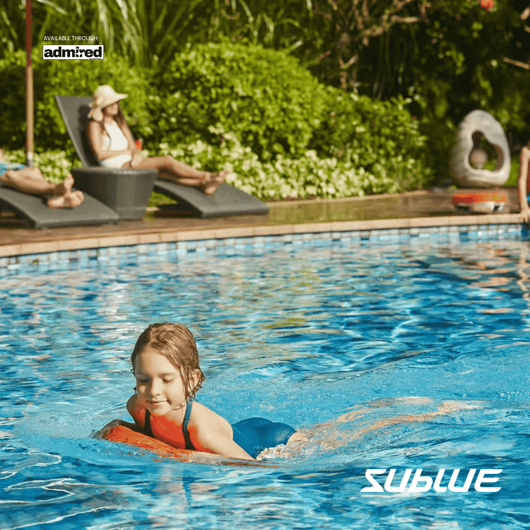 Child swimming with SUBLUE Swii kickboard, family enjoying water fun in a pool.