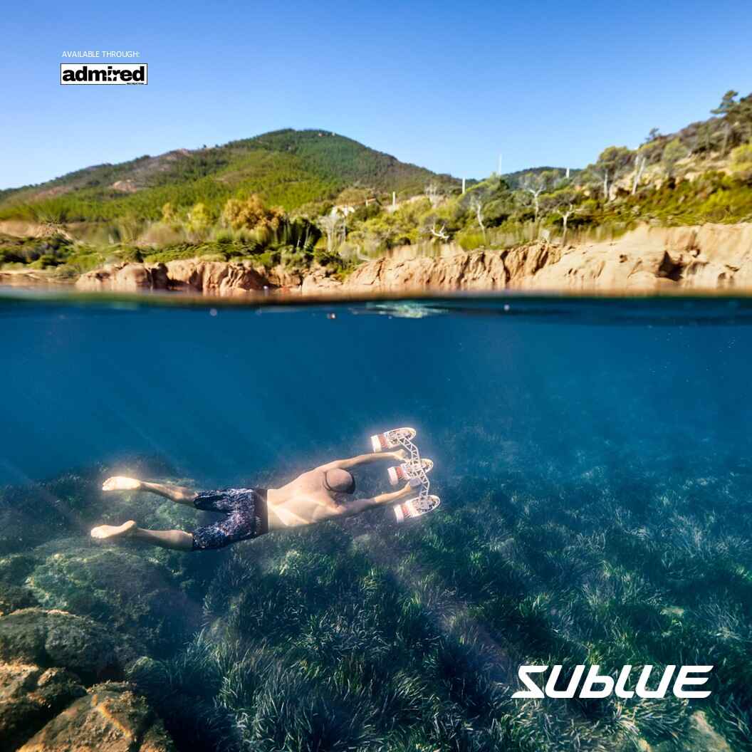 A Man using Sublue Tini with 3 motors while snorkeling in a remote island - Admired Recreation