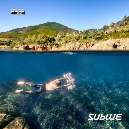 A Man using Sublue Tini with 3 motors while snorkeling in a remote island - Admired Recreation