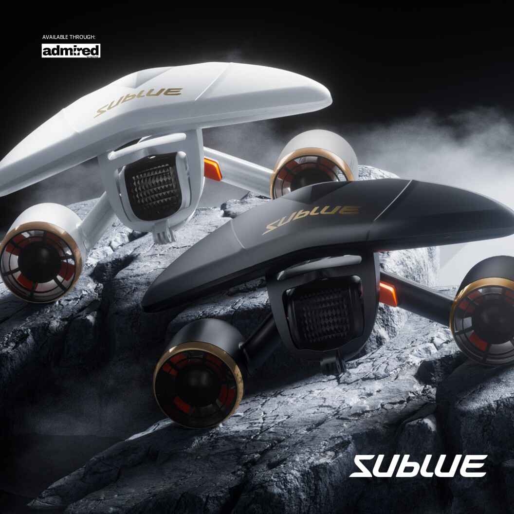 Sublue MixPro underwater scooters in white and black on rocky surface