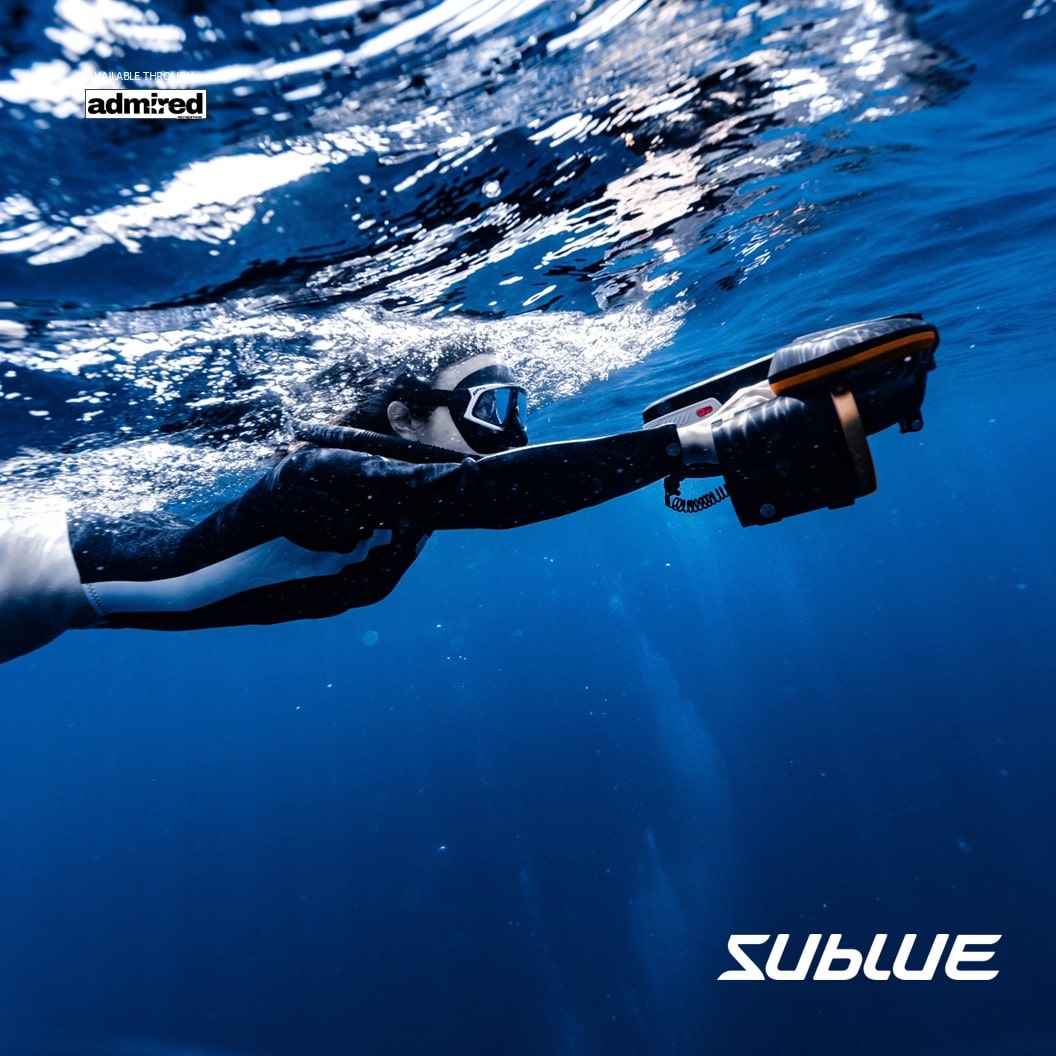 A person in a diving suit underwater